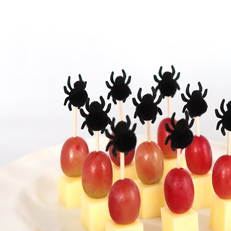 Pom pom spiders for Halloween