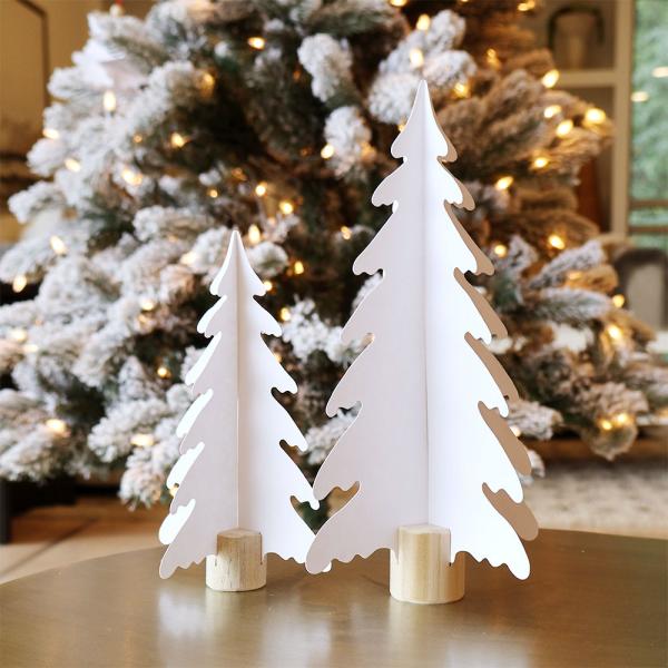Christmas trees with wooden stands